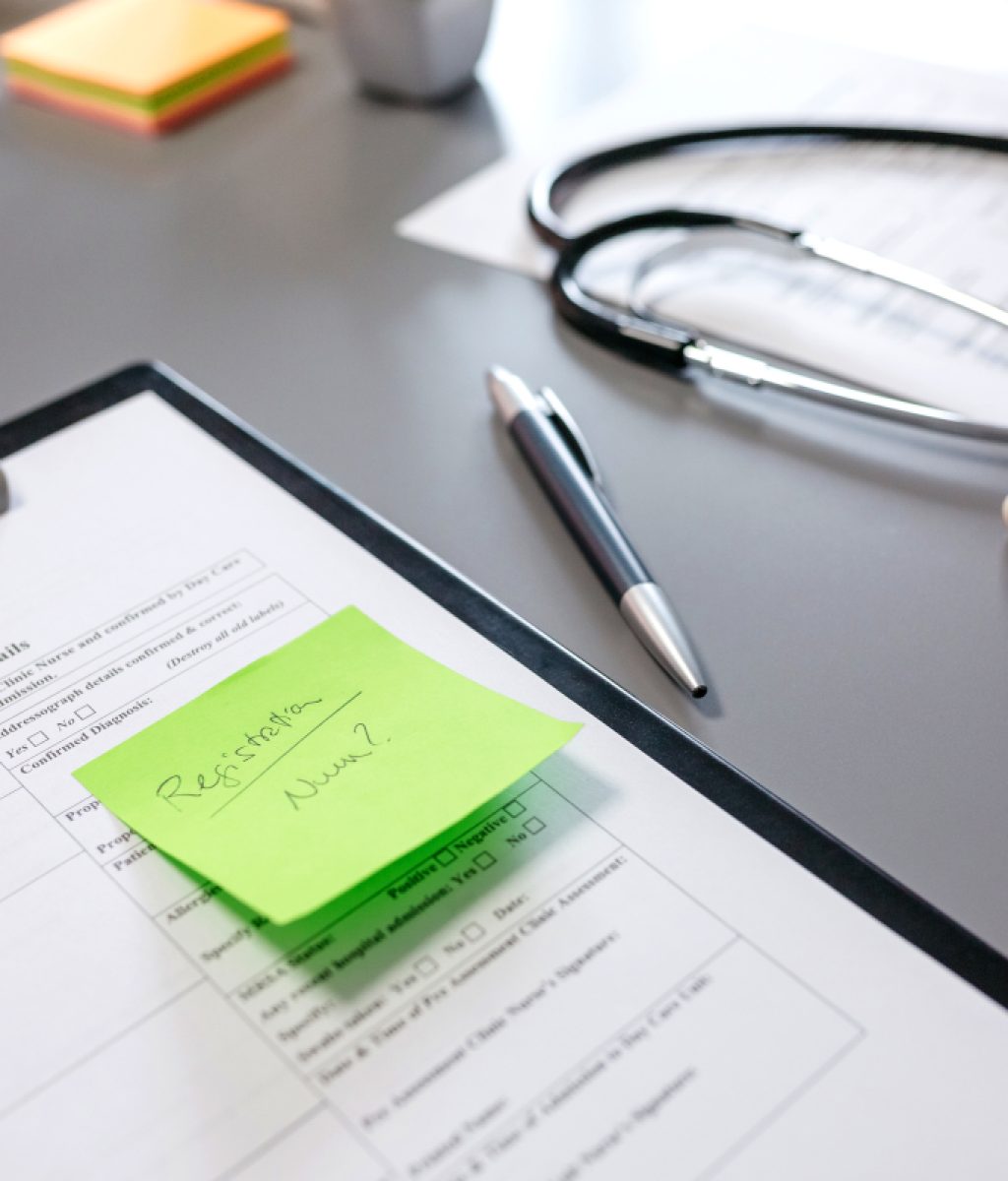 doctor-desk-with-documents-and-stethoscope